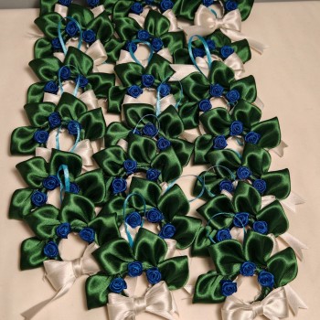 Bomboniera da 4 cm di diametro con gancio, o calamita, o spilla.