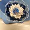 Bouquet con 7 rose blu e un girasole grande